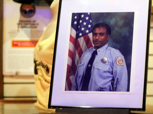 A portrait of Officer Rodney Thomas greeted fundraiser attendees at the entrance Tipitina's on Thursday evening. (Robert Morris, UptownMessenger.com)