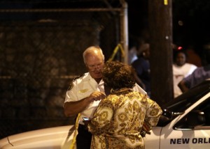 NOPD Sixth District Bob Bardy discusses the shooting with community activist Barbara Lacen-Keller. (Robert Morris, UptownMessenger.com)