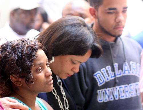 Andrea Samuels, City Councilwoman LaToya Cantrell and Keion Reed at a news conference at Cafe Reconcile on Friday afternoon. (Robert Morris, UptownMessenger.com)