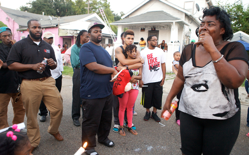 Cheryl M. Jordan, whose son was shot but survived, speaks out against gun violence at the vigil for Londyn Samuels Friday night. (Sabree Hill, UptownMessenger.com)