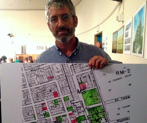 Irish Channel resident Mark Redding appeared before city council Wednesday with a map of all the blighted properties in his neighborhood. (Photo by Della Hasselle for MidCityMessenger.com)