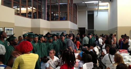 Graduates of Crew 26 line up. (photo by Timothy D. Ray for UptownMessenger.com)