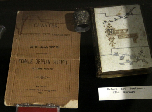 Mementos from the nearly two-century history of Poydras Home, including a charter from 1891 and daguerreotypes dated back to the Civil War. (Robert Morris, UptownMessenger.com)