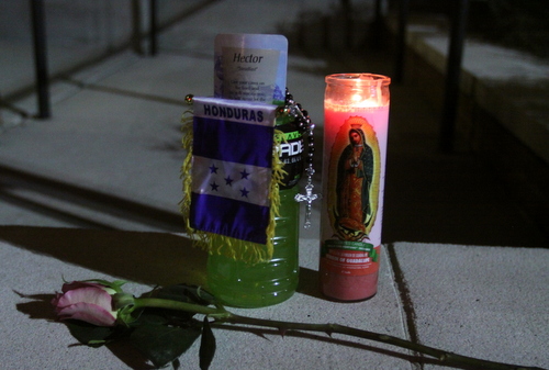 An impromptu memorial to Trochez sits on a ledge at the bank. (Robert Morris, UptownMessenger.com)