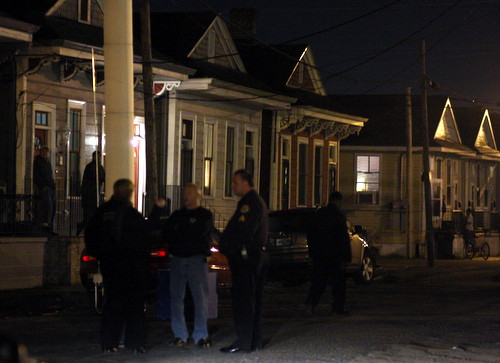Police investigate a fatal shooting in the 4500 block of South Robertson. (Robert Morris, UptownMessenger.com)