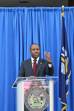U.S. Attorney Kenneth Polite speaks on the steps of City Hall in commemoration of Martin Luther King Day. (Zach Brien, UptownMessenger.com)
