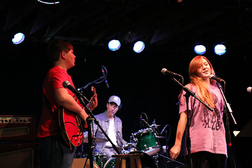 Siblings Ian (guitar, left) and Eryn (vocals, right) play the classic "House of the Rising Sun". The attendees were allowed to have a jam session after the instruction was over.