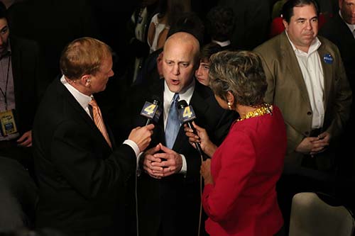 New Orleans mayor Mitch Landrieu speaks with Eric Paulsen (left) and Sally-Ann Roberts (right) of WWL TV