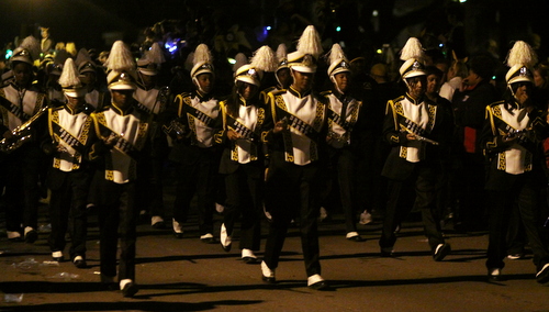 The young women of St. Katharine Drexel Prep march in the Hermes parade. (Robert Morris, UptownMessenger.com)