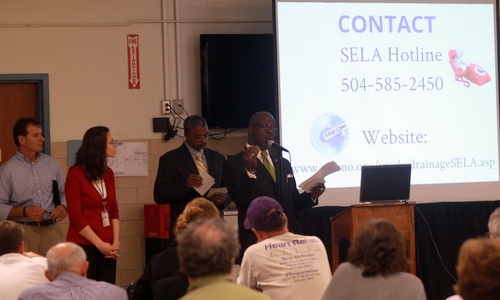 John Fogerty and Lori Wingate of the U.S. Army Corps of Engineers and Ron Spooner and Robert Jackson of the Sewerage and Water Board of New Orleans field questions from a crowd of 100 people about the next leg of the Napoleon Avenue drainage project on Tuesday.