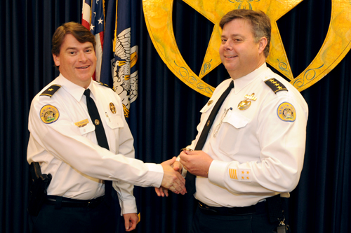 Commander Frank Young receives his promotion from NOPD Superintendent Ronal Serpas on Friday morning. (photo courtesy of NOPD Sgt. Walter Powers)