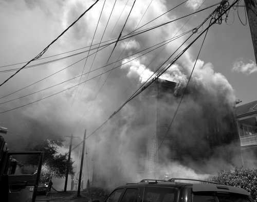 Firefighters battle a blaze on Camp Street. (photo courtesy of Bob Perrin)