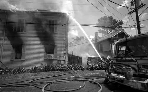 Firefighters battle a blaze on Valmont Street. (photo courtesy of Bob Perrin)