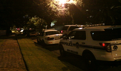 New Orleans Police vehicles line the 1100 block of Soniat Street after a home invasion was reported there Tuesday evening. (Robert Morris, UptownMessenger.com)