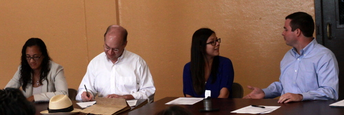 The International School of Louisiana's outgoing board president Matt Amoss (far right) welcomes new member Vanessa Diaz to the board. Dominique Wilson (far left) will serve as the board's new president. (Robert Morris, UptownMessenger.com)