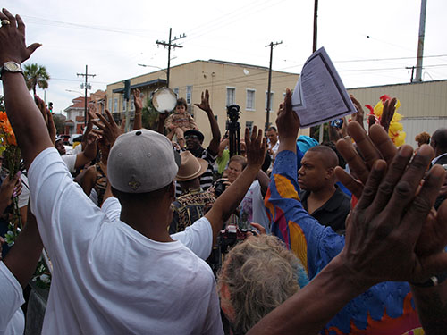 Doves were released for the deceased ancestors outside of the Ashe Cultural Arts Center as part of Sunday's ceremony. (Zach Brien, UptownMessenger.com)