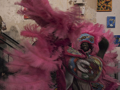 Allen Womble, first spy boy of the Cheyenne Hunters, and Darryl O'Neal, flag boy of the Cheyenne Hunters dance at the Mardi Gras Indian Hall of Fame ceremony at the Ashe Cultural Center. (Zach Brien, UptownMessenger.com)