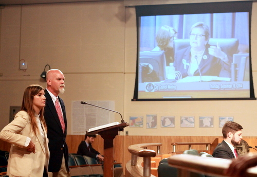 Megan Fuselier and Matt Wilson (left) and Safety and Permits director Jared Munster (far right) listen as Councilwoman Susan Guidry speaks during Thursday's meeting of the New Orleans City Council. (Robert Morris, UptownMessenger.com)