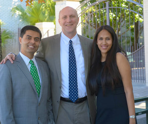 Dr. Tarun Jolly, Newman School leader Dale M. Smith, and Dr. Rupa Jolly (via Newman School)