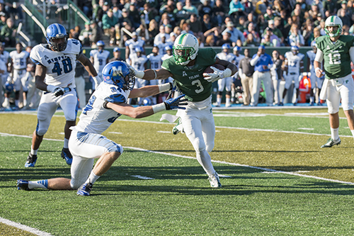 Tulane running back Sherman Badie stiff arms Memphis linebacker Jackson Dillon. (Zach Brien, UptownMessenger.com)