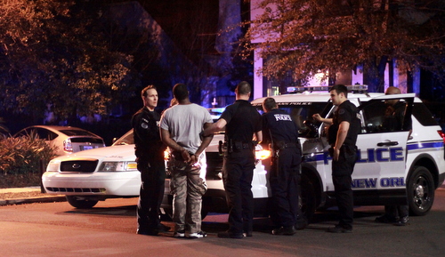 Police take a suspect into custody following a manhunt that closed several streets around Broadway and Fontainebleau on Monday evening. (Robert Morris, UptownMessenger.com)