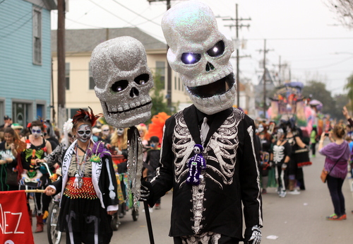 The Skinz and Bonez gang marches on Magazine Street with the Krewe of Okeanos. (Robert Morris, UptownMessenger.com)
