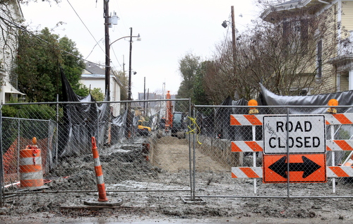 Tall tarps line both sides of Prytania Street, seen from Nashville Avenue. (Robert Morris, UptownMessenger.com)