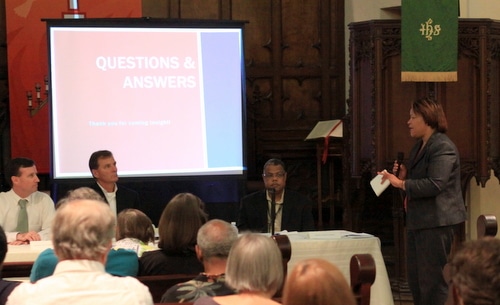 City Councilwoman LaToya Cantrell raises a question with officials from the Sewerage and Water Board of New Orleans, the U.S. Army Corps of Engineers, and the Regional Transit Authority on Tuesday evening at First Presbyterian Church. (Robert Morris, UptownMessenger.com)