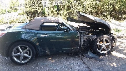 A photo of the car after it was set on fire in late March in the 700 block of Pine Street. (photo courtesy of the victims)