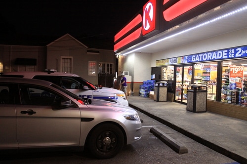 A NOPD vehicle sits outside the Circle K on Magazine Street on Monday evening. (Robert Morris, UptownMessenger.com)