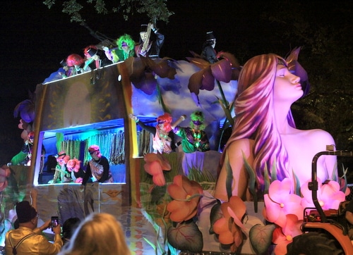 The Krewe of Pygmalion "Brilliance of Iris" float rolls on Napoleon Avenue. (Robert Morris, UptownMessenger.com)