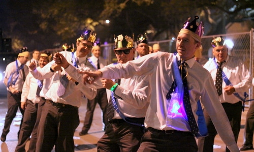 Monument Men dance as Le Krewe d'Etat rolls on Napoleon Avenue. (Robert Morris, UptownMessenger.com)