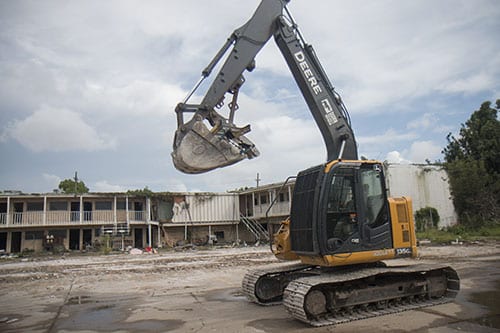 Demolition of the Capri motel began on Tuesday evening. (Zach Brien, UptownMessenger.com)