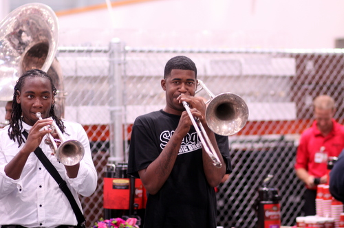 The Stooges Brass Band play during the Costco grand opening ceremonies. (Robert Morris, UptownMessenger.com)