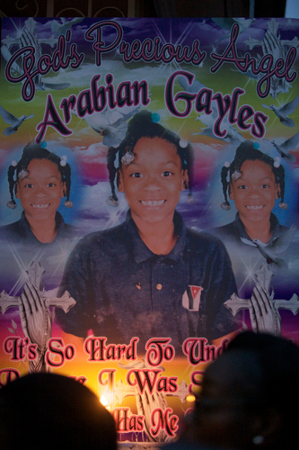 Friends, family and community members gather at the vigil for  Arabian Gayles. (Sabree Hill, UptownMessenger.com)