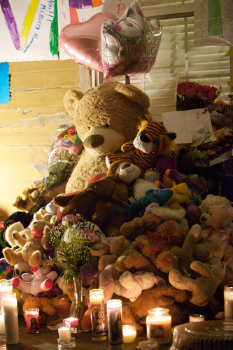 Stuffed animals, balloons and candles at the vigil for Arabian Gayles. (Sabree Hill, UptownMessenger.com)