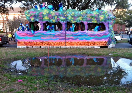 A float is reflected in the watery grave of a crepe myrtle. (photo by Jean-Paul Villere for UptownMessenger.com)