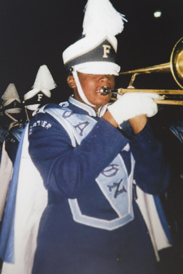Chris playing trombone at Forshey High School.