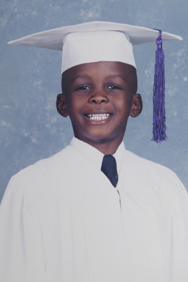 Desmond at his school graduation as a child.