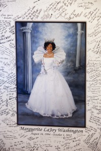 A photograph of LaJoy as the reigning Queen of The New Orleans Chapter of Delta Sigma Theta Sorority, was signed by hundreds at her funeral. (Sabree Hill, UptownMessenger.com)