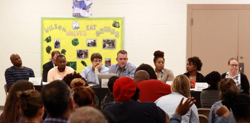 The Wilson governing board listens to parents' concerns during the meeting. (Robert Morris, UptownMessenger.com)