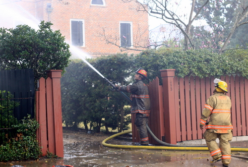 Firefighters battle the blaze on Philip Street.  (Robert Morris, UptownMessenger.com)