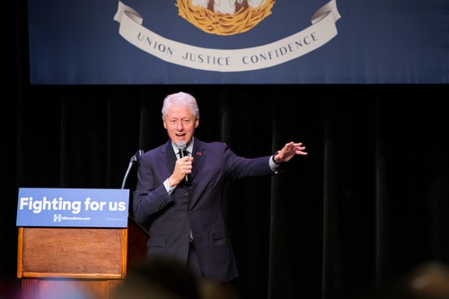 Former President Bill Clinton addresses the crowd at Ashe Power House in Central City on Friday morning. (Sabree Hill, UptownMessenger.com)