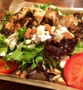 Best Little House Salad of Mixed Greens, Donut Croutons, Blackened Chicken, Goat Cheese, Campari Tomatoes, Slivered Almonds and Vinaigrette (Froeba)