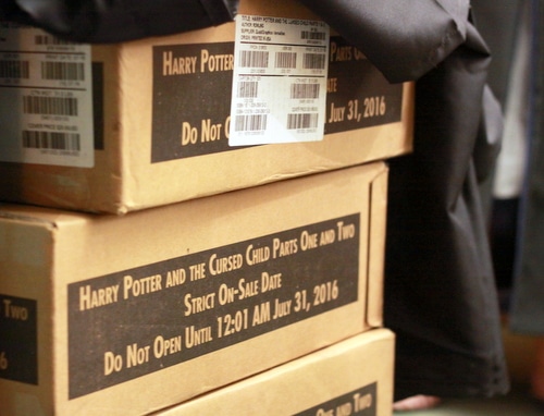 The sealed boxes of "Harry Potter and The Cursed Child" insist that they not be opened until 12:01 a.m. Sunday, July 31. (Robert Morris, UptownMessenger.com)