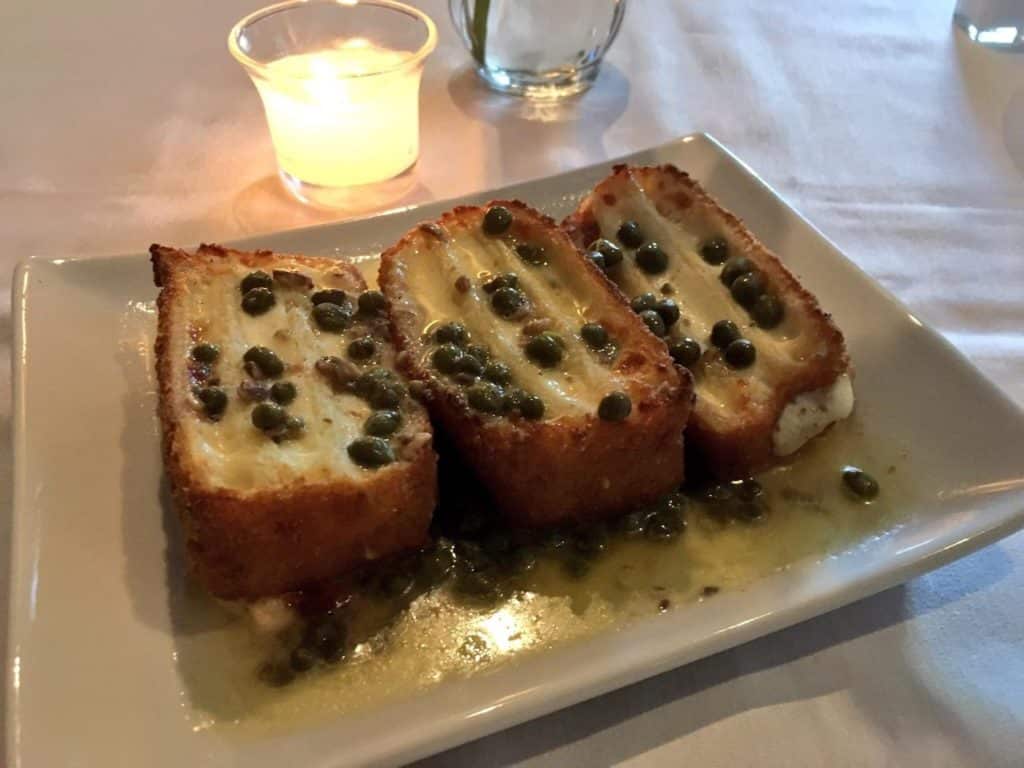 Spiedini Mozzarella, pan-fried thick house bread topped with Mozzarella with an Anchovy-Lemon Caper Sauce, the way Frank Sinatra ordered it (Kristine Froeba)