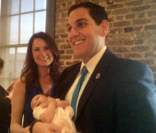 State Rep. Walt Leger holds his new baby daughter, Kate, while standing with his wife, Danielle, at Monday's fundraiser. (Danae Columbus for UptownMessenger.com)