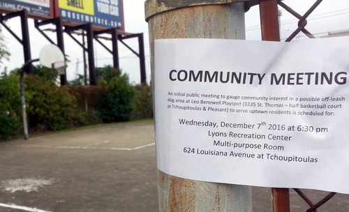 A sign at the basketball court at Pleasant and Tchoupitoulas advertises the discussion held Wednesday about the dog park. (Robert Morris, UptownMessenger.com)